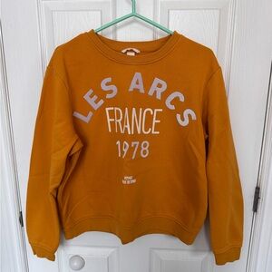 H&M Les Arcs France 1978 Graphic Crewneck Sweatshirt Mustard Orange Size L